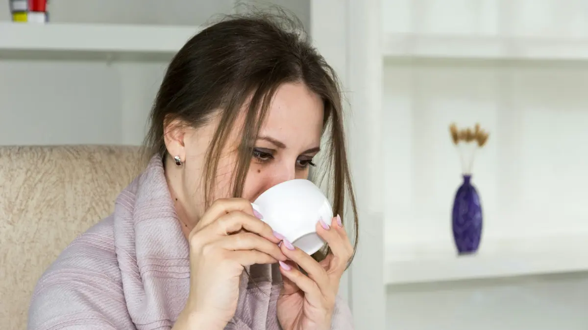 Black Mold Symptoms - Woman experiencing cold and high fever from indoor mold exposure
